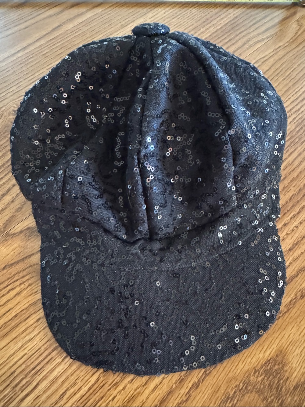 black newsboy cap all-over sequin finish for a sparkling retro look one size